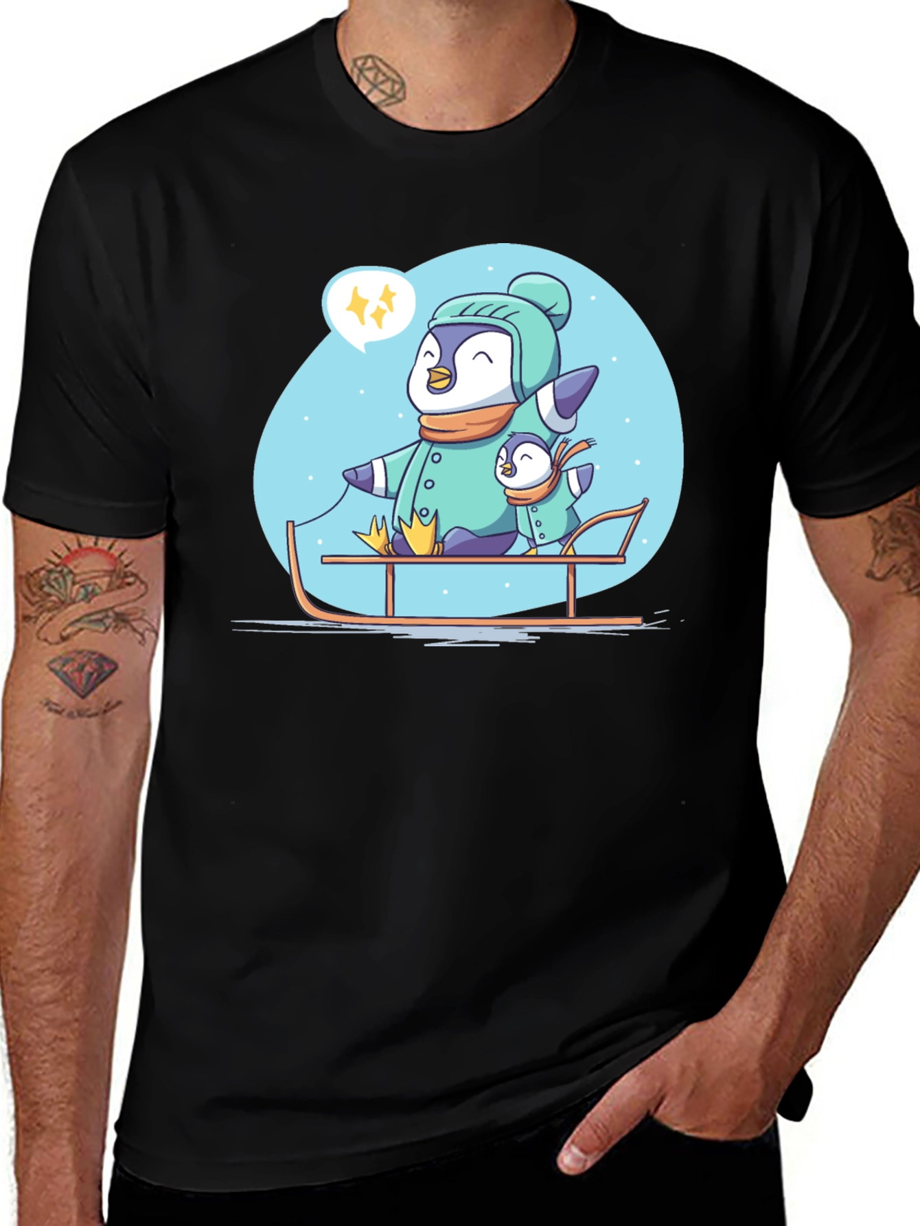 Penguin Family Sledding Graphic Tee